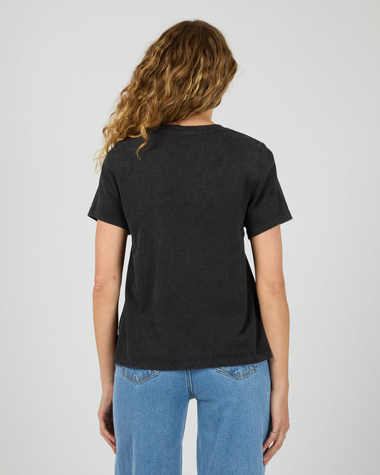 Women’s relaxed fit washed black tee — back angle