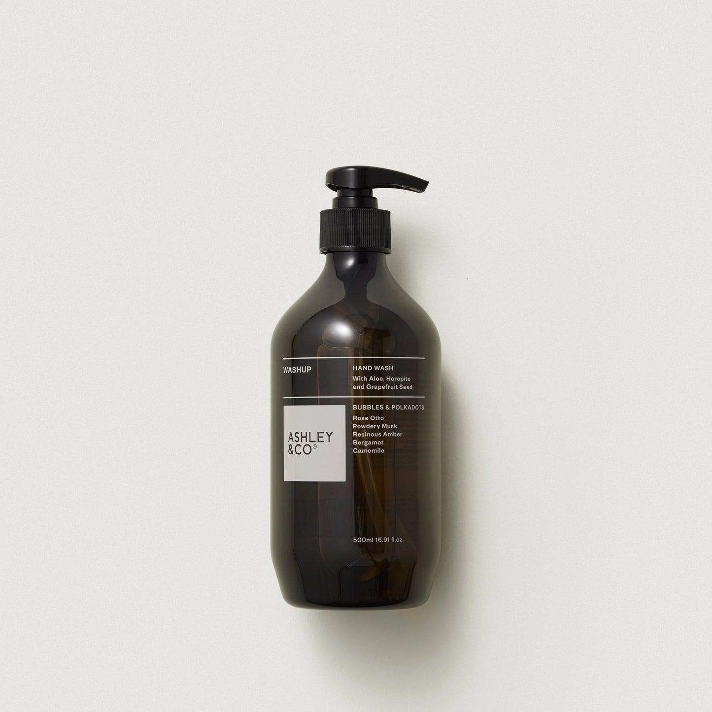 Brown hand wash bottle with pump Ashley & Co on a light gray background