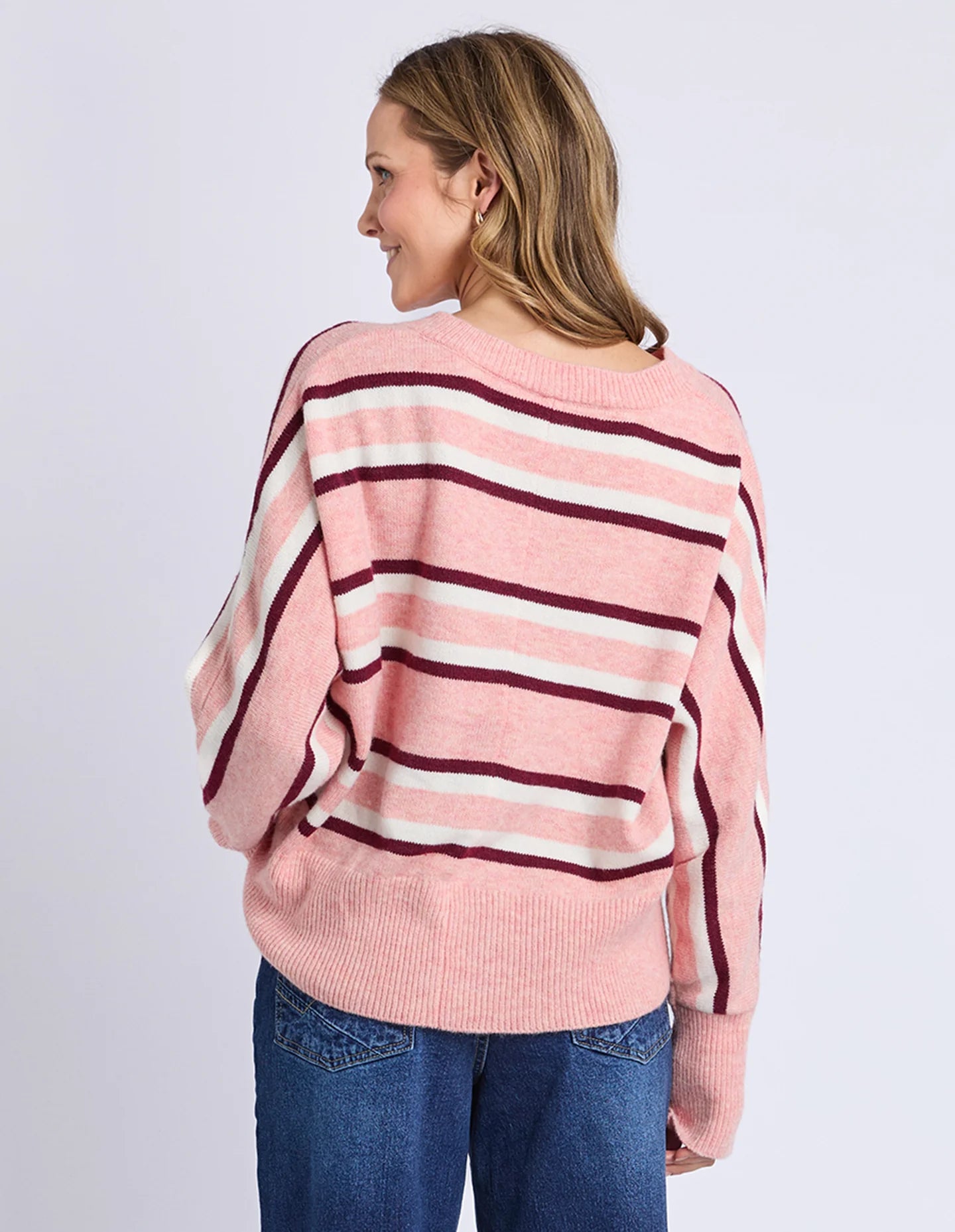 Back view of Elm Elsa Stripe Knit in Rose Stripe — relaxed silhouette