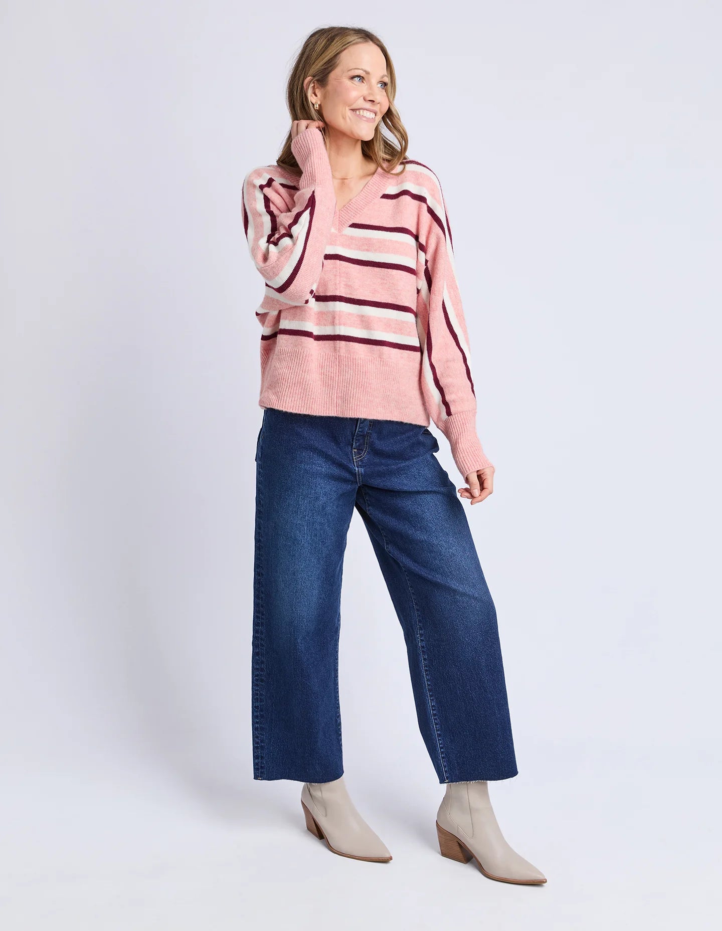 Model wearing Elm Elsa Stripe Knit in Rose Stripe — cosy NZ style