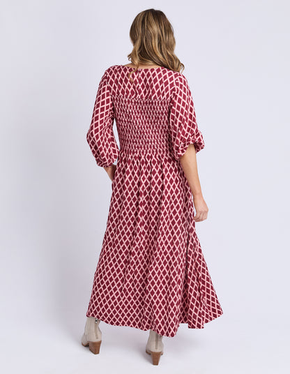 Back view of Elm Kiruna Dress in Diamond Print — relaxed skirt drape