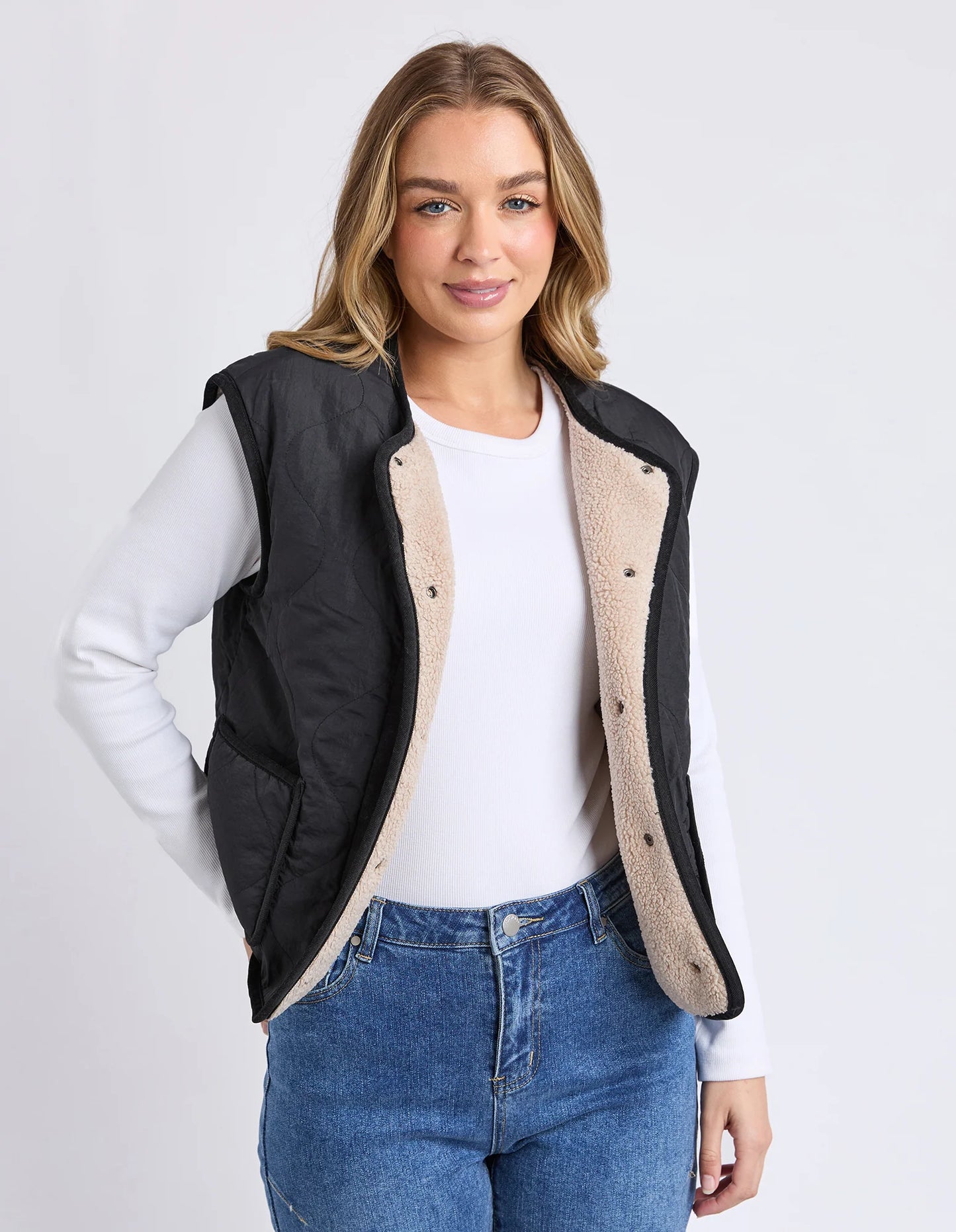 Foxwood Alberta Vest in Black — lightweight quilted vest with sherpa lining and snap‑front closure.