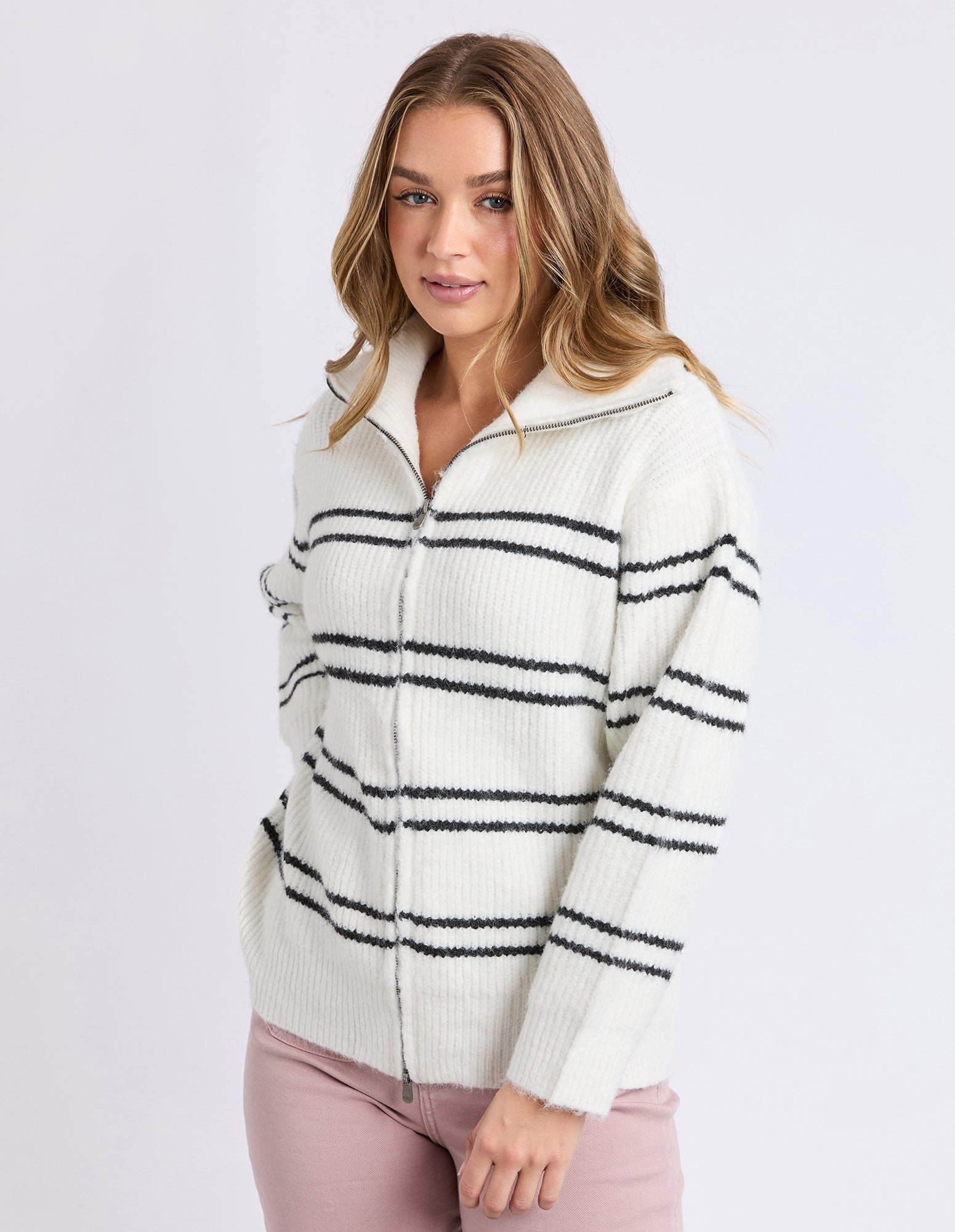 Foxwood Journey Zip Knit in White — relaxed striped zip‑front knit with soft recycled‑fibre blend.