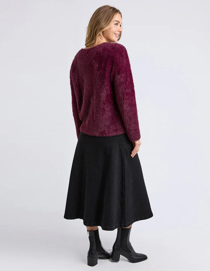 Back view of the Kenny Cardi highlighting relaxed silhouette and rich wine colour.

