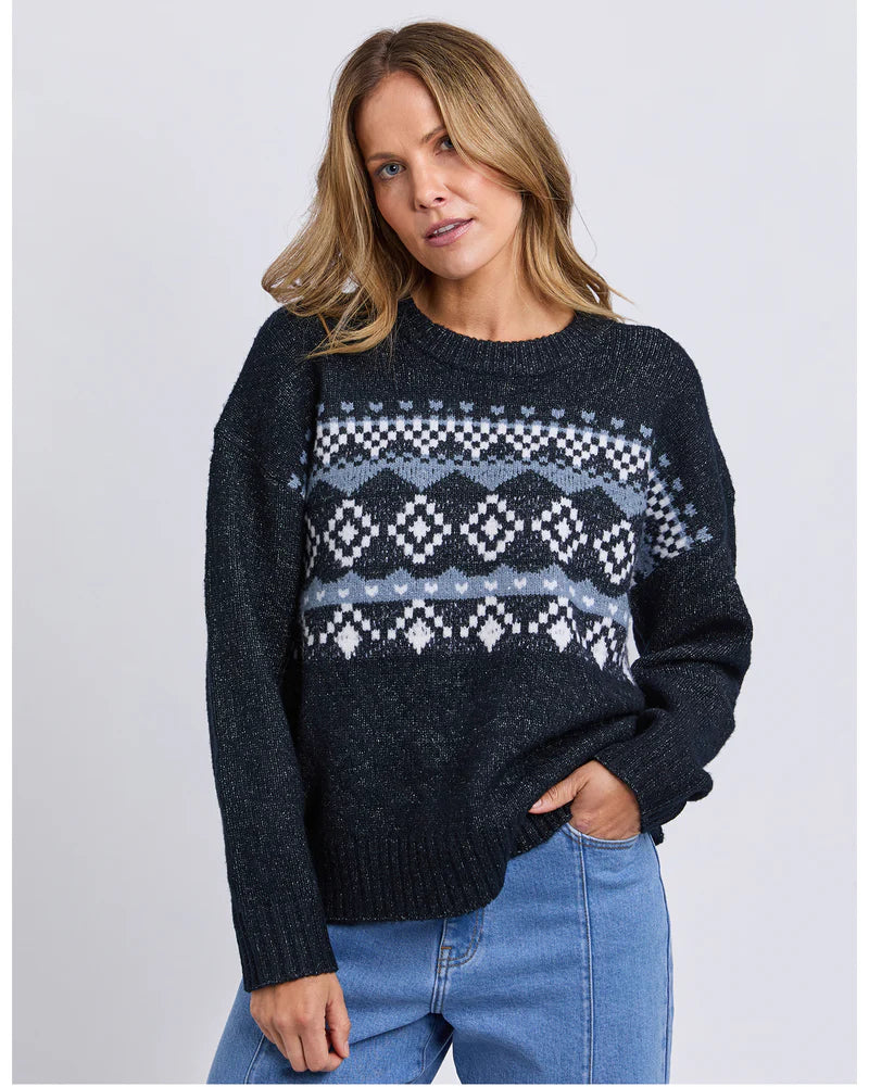 Foxwood Panorama Knit in Navy — cosy winter knit with warm‑toned intarsia pattern, relaxed fit and ribbed trims.