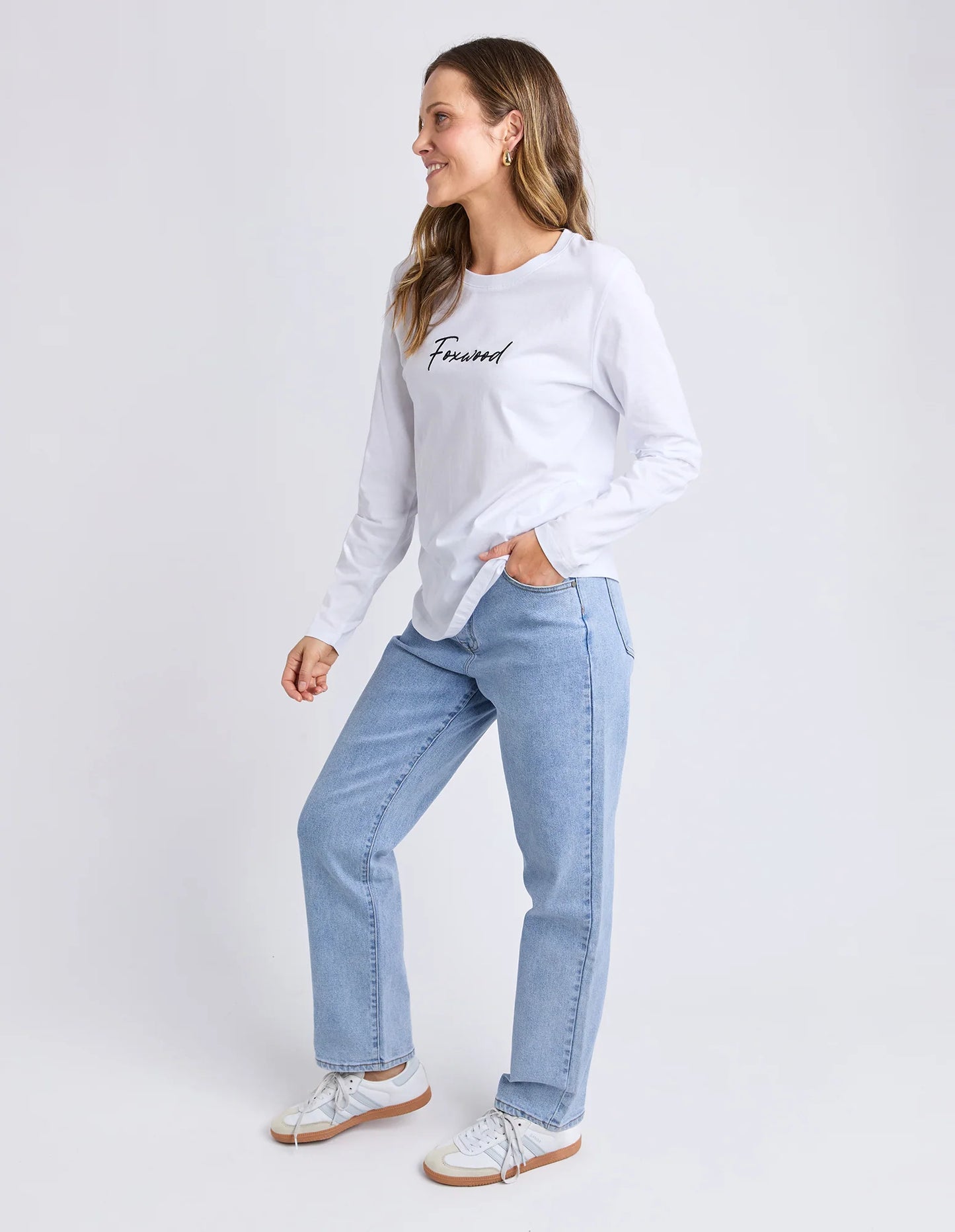 Women’s curved hem long sleeve top — side profile
