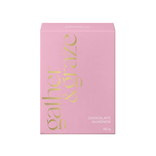 Pink packaging of Gather & Graze with gold text on a white background